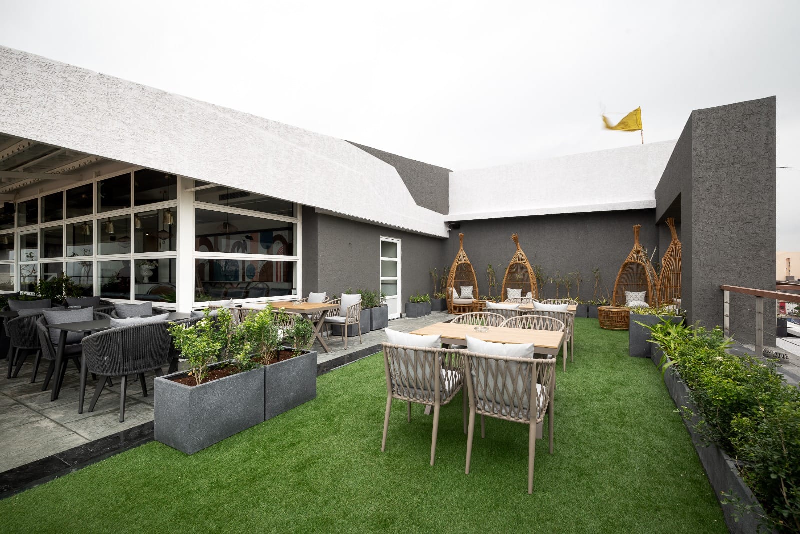 Rooftop lawn terrace set for an evening event