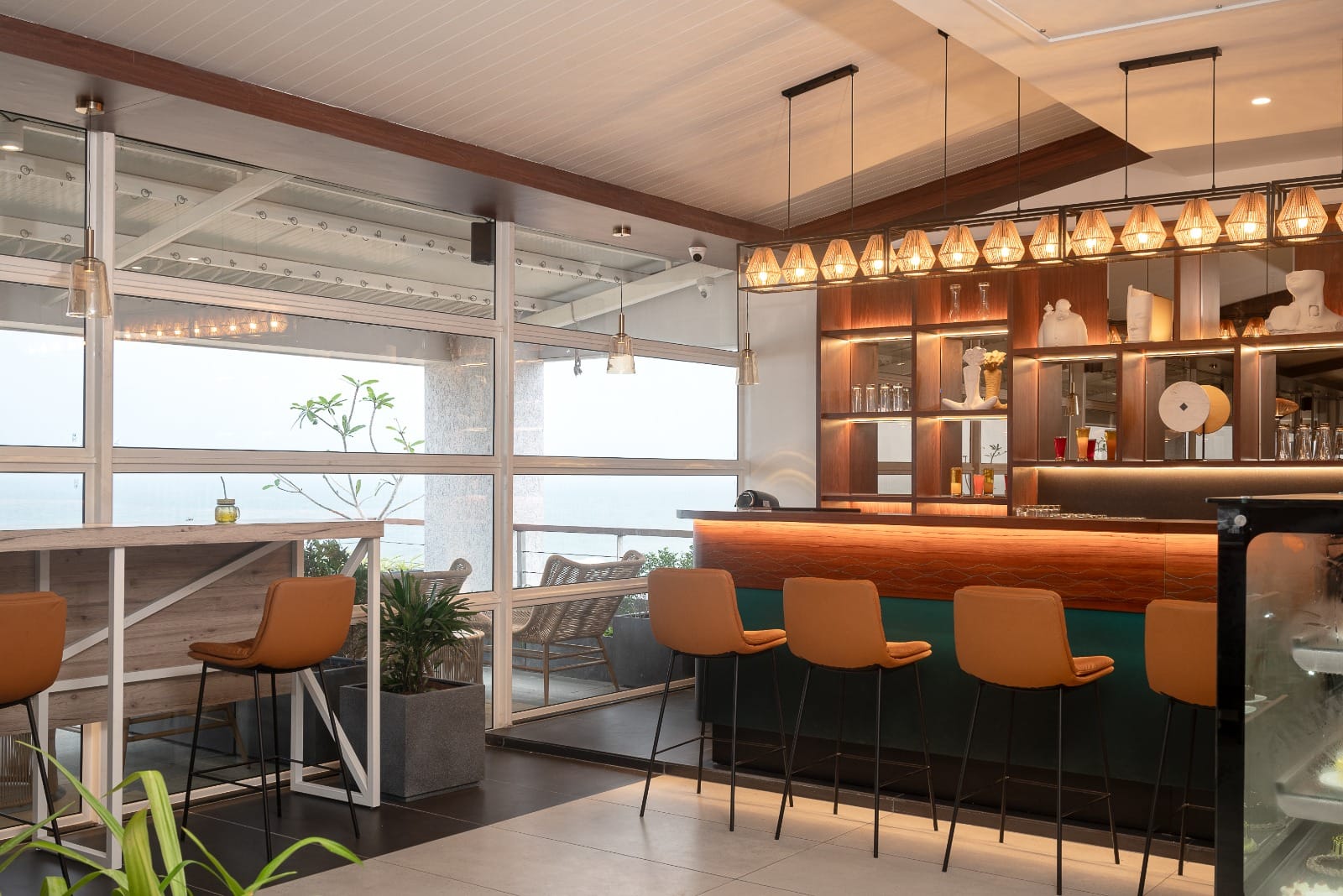 Sundowner Cafe bar counter facing the sea
