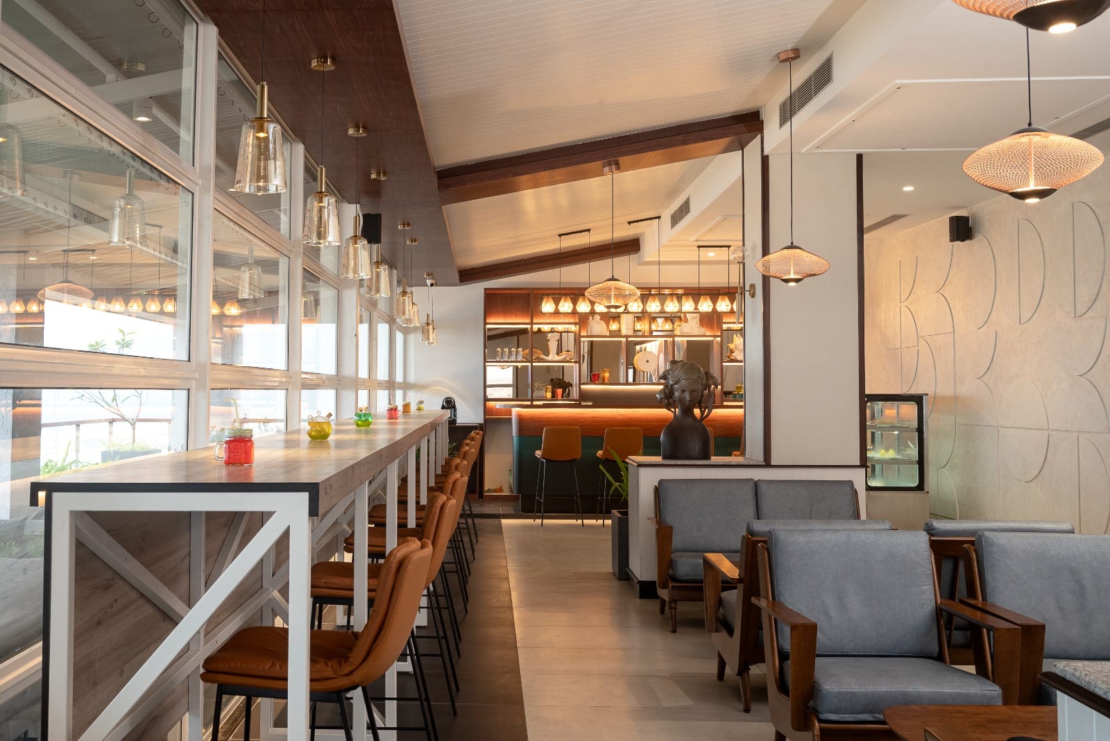 Bar counter and lounge seating at the rooftop cafe